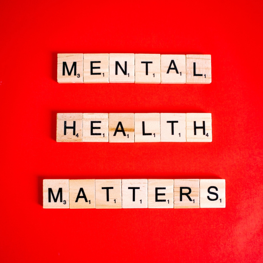 Mental Health Matters scrabble letters on a red background